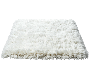 Fluffy white rectangular rug isolated on a dark background