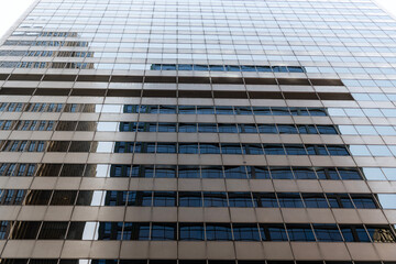 Architectural detail. Background of architecture. Modern glass background. Reflective glass background. Architecture geometry. Building architecture. Building background. Glass building window