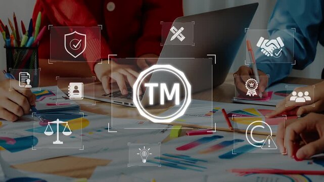 A dynamic business team engages in a collaborative project, utilizing a laptop and colorful graphics. The setting reflects modern workplace innovation and teamwork. Raster