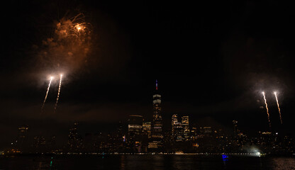 New York Manhattan fireworks. New York Fireworks over Manhattan. New York City 4th of July Fireworks. New York City Skyline Manhattan with Flashing Fireworks. Independence day.