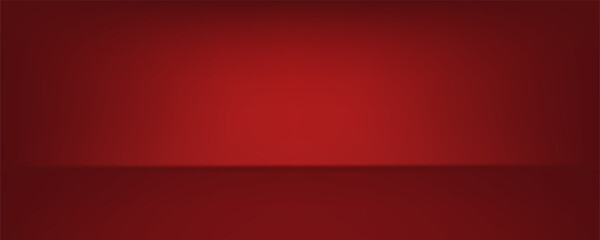 Obraz premium Dark red background with subtle highlight effect. The spotlight creates a gradation from bright red in the center to dark red at the edges. The background has a bit of a rough texture.