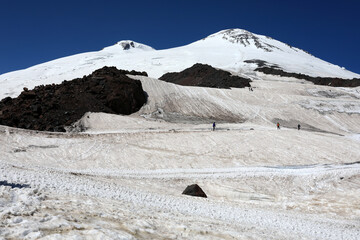 Climber Descending Snow Slope Mount