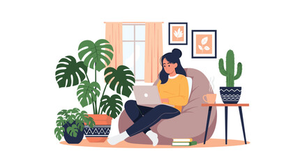 Fototapeta premium Creative woman works comfortably on her laptop while sitting in a large bean bag chair surrounded by lush green houseplants.