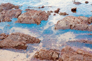 rocks in the sea in greece