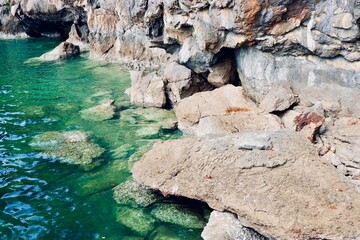 rocks in the sea in greece