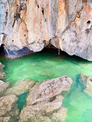 rocks in the sea in greece