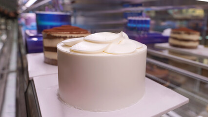 Creamy Vanilla Cake with Smooth Icing in Refrigerated Display