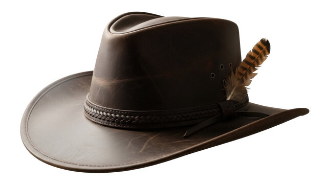 Brown leather cowboy hat with feather isolated PNG, western style headwear for fashion and outdoor adventures on transparent background