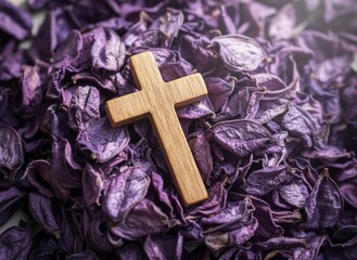 Wooden cross on purple ashes background, Christian religious symbol for Ash Wednesday and Lent, spiritual faith concept representing repentance, devotion, reflection
