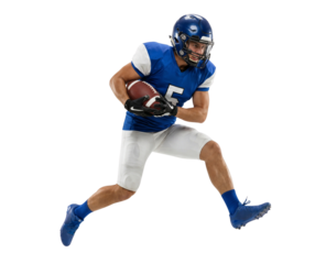 Young Male American Football Player in Blue Uniform Leaping with Ball Isolated on White Background