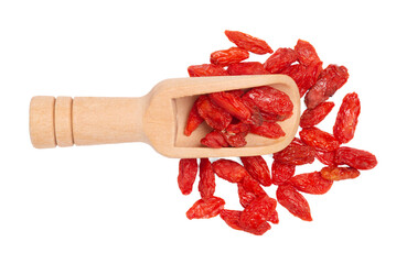 Top view dried goji berries in wood scoop on white background.