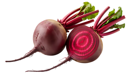 Two fresh beets, one whole and one halved showing vibrant red rings and green leaves on black beetroot isolated on a transparent background