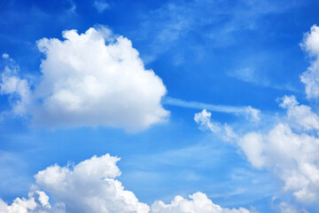Blue Sky with Fluffy White Cumulus Clouds.