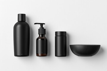 Minimalist black beauty products arrangement on white background