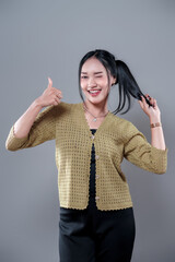 Indonesian Woman Winking and Giving Thumbs Up