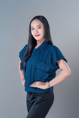 Confident Indonesian Woman in Modern Casual Outfit