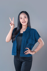 Indonesian Woman Showing Peace Sign with Confident Smile