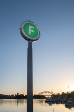 a green F indicating the ferry terminal in Balmain, with the Sydney Harbour Bridge in the background