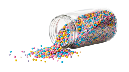Colorful round sprinkles spilling from a transparent glass jar isolated on a transparent background