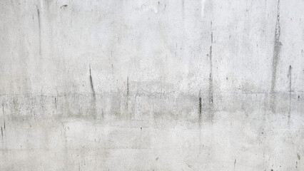 Weathered Concrete Wall: A close-up view reveals a textured concrete wall, marked by subtle...