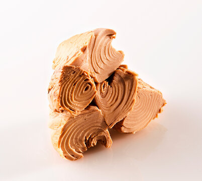 Stack of cooked tuna filet isolated on white background