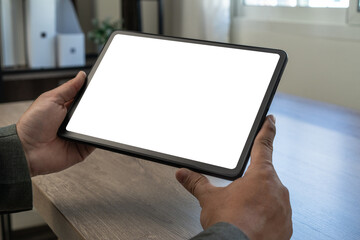 Pad digital tablet with blank screen man holding tablet mockup image of a business replaces your design mockup