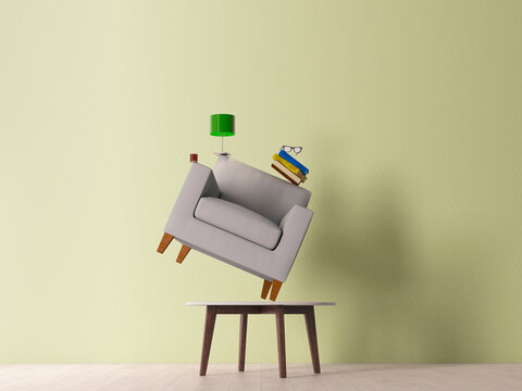 Symbolic balance with stacked armchair and objects in a modern living room