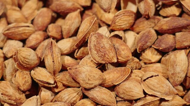 Closeup of almonds，organic badam nuts background.