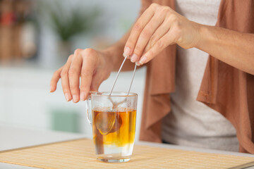 close view of tea infusing into water