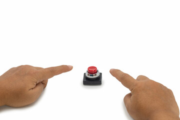 Two human hands pointing toward a red emergency stop button on white background, representing hesitation, decision-making, shared responsibility, and urgent safety control in critical situations.
