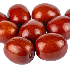 Obraz premium Ripe purple plums and juicy red fruit isolated on a white background create a fresh organic food composition of delicious healthy raw vegetarian sweets