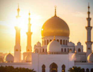 Blurred mosque, golden dome, minarets in bright sunlight