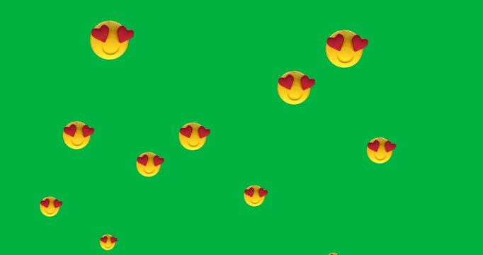 Multiple heart eyes face emoji moving against black background