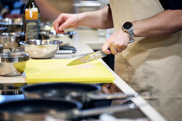 hands of a man with a glass of champagne