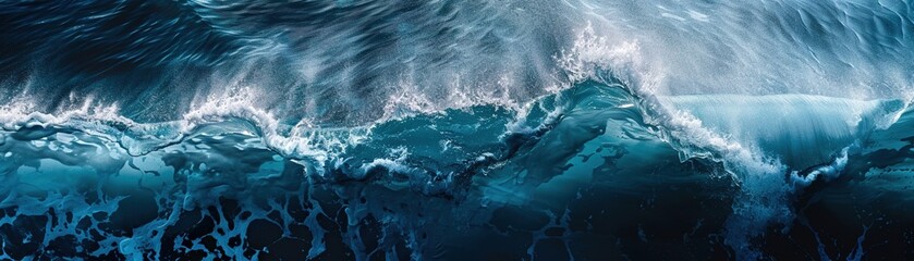 Abstract ocean waves in shades of blue crashing together