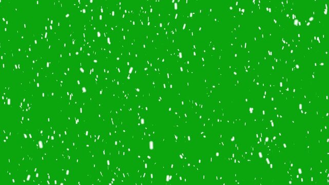 Winter snowfall overlay, falling snow flakes on green screen background. Snowfall animation Christmas or new year seasonal 4k videos loop.