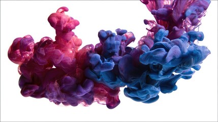 Vibrant pink and blue ink clouds floating in water