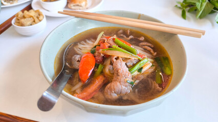 Vietnamese Beef Noodle Soup with Clear Broth and Fresh Herbs