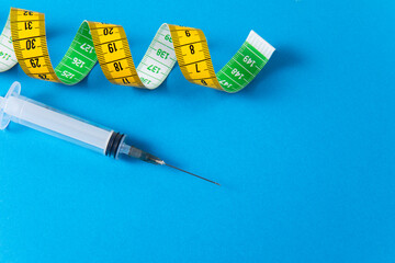 syringe and tape measure