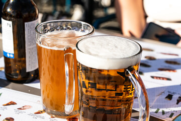 Two glasses of beer on the table