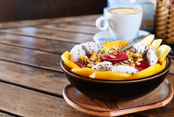 Smoothie bowl with fresh fruit and granola, healthy eating