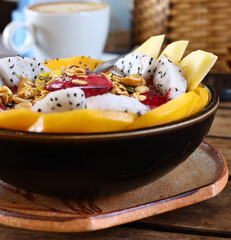 Smoothie bowl with fresh fruit and granola, healthy eating