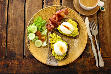 traditional breakfast with fried egg and salad