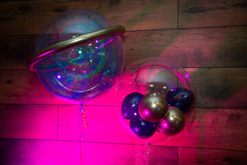 Bright multi-colored inflatable balloons for holiday decoration.