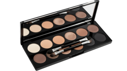 Open makeup palette with neutral eyeshadows and brushes