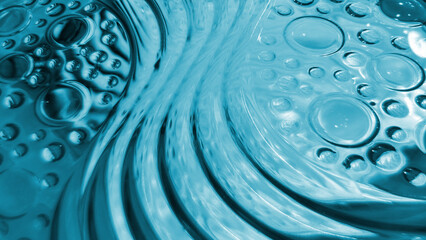 Textured light blue glass block wall featuring wavy water pattern and embossed circular bubble details. Abstract glass texture is perfect for modern architectural or aquatic designs