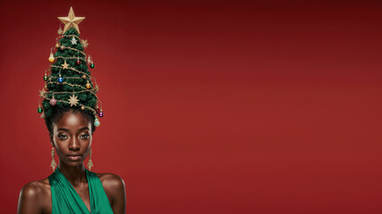 Photorealistic portrait of a black woman in a bright green dress, evening makeup, and a high cone hairstyle styled as a Christmas tree with ornaments, garlands, glowing star on top, soft frontal ligh