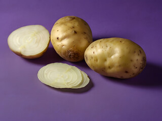 potatoes on purple background