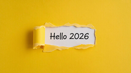 Vibrant Hello 2026 message on torn yellow background