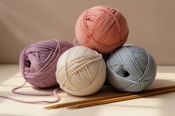 Yarn Balls And Knitting Needles featuring yarn balls with knitting needles on a soft surface, created as a calm neutral scene for creative projects, hobby blogs and art related layouts 